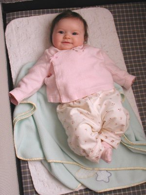 Lea resting in her playpen